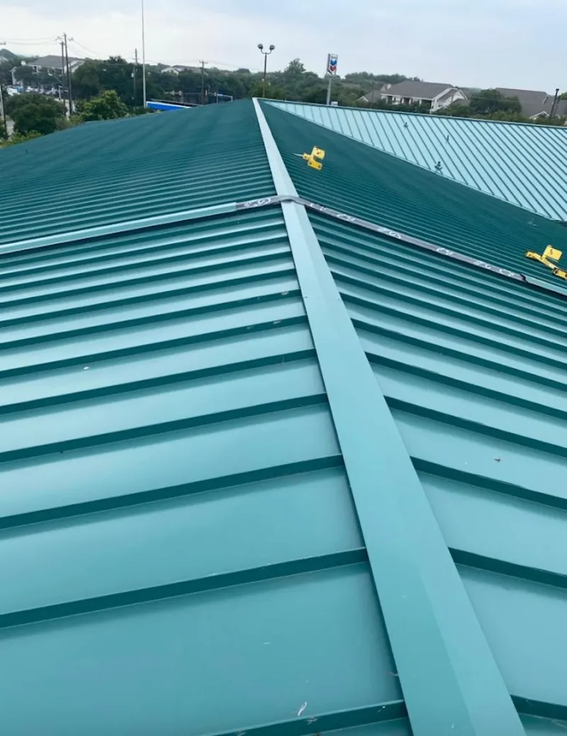 Green commercial metal roof ridge and valley for Metal Roof Repair in Prairieville
